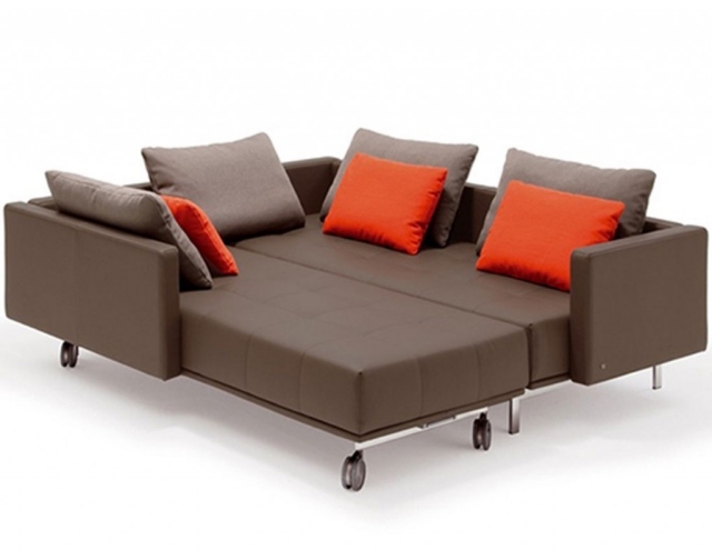 canapé-lit-salon-confort-complet-idée-originale-coussins-oranges