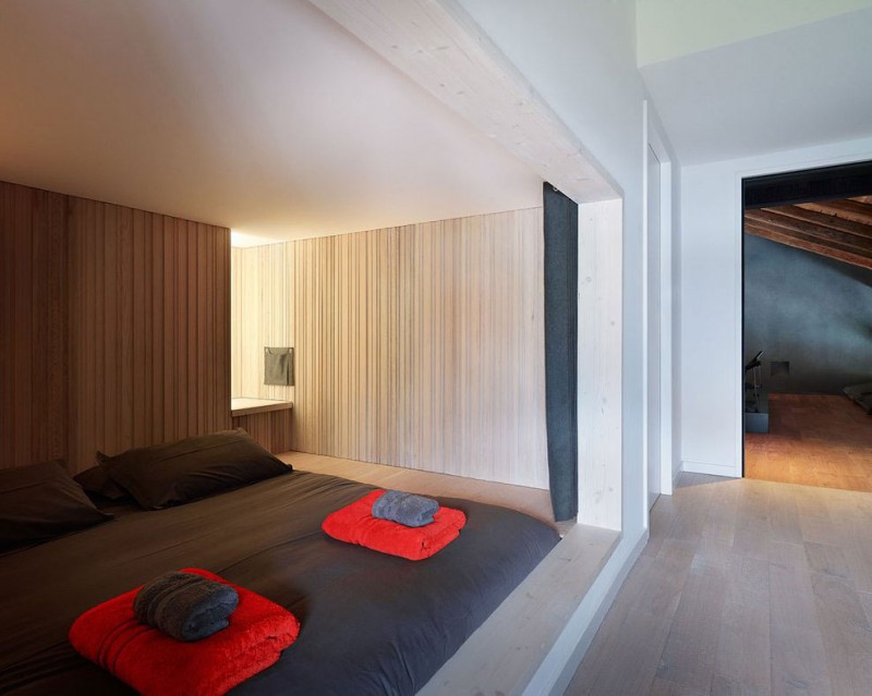 chambre à coucher modèle de maison moderne montagne bois  villa france jka fuga contemporain morzine france draps rouge