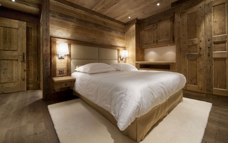 chambre à coucher bois chalet montagne les gentianes ancien style courchevil élégance confort alpes ski