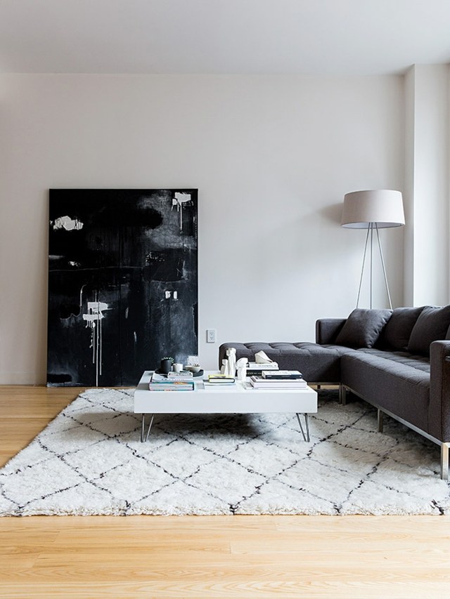 salon style minimaliste murs blanc meubles noir