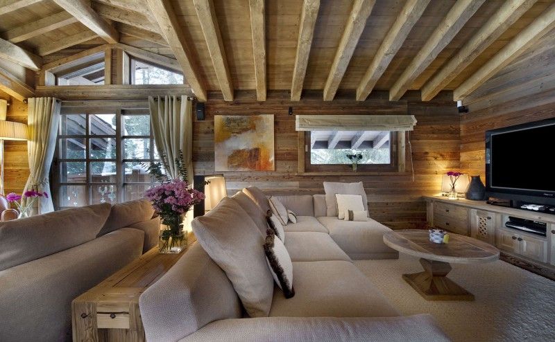 salon style vieux beau chalet montagne les gentianes courchevil confort style bois maison canapé vacances ski alpes