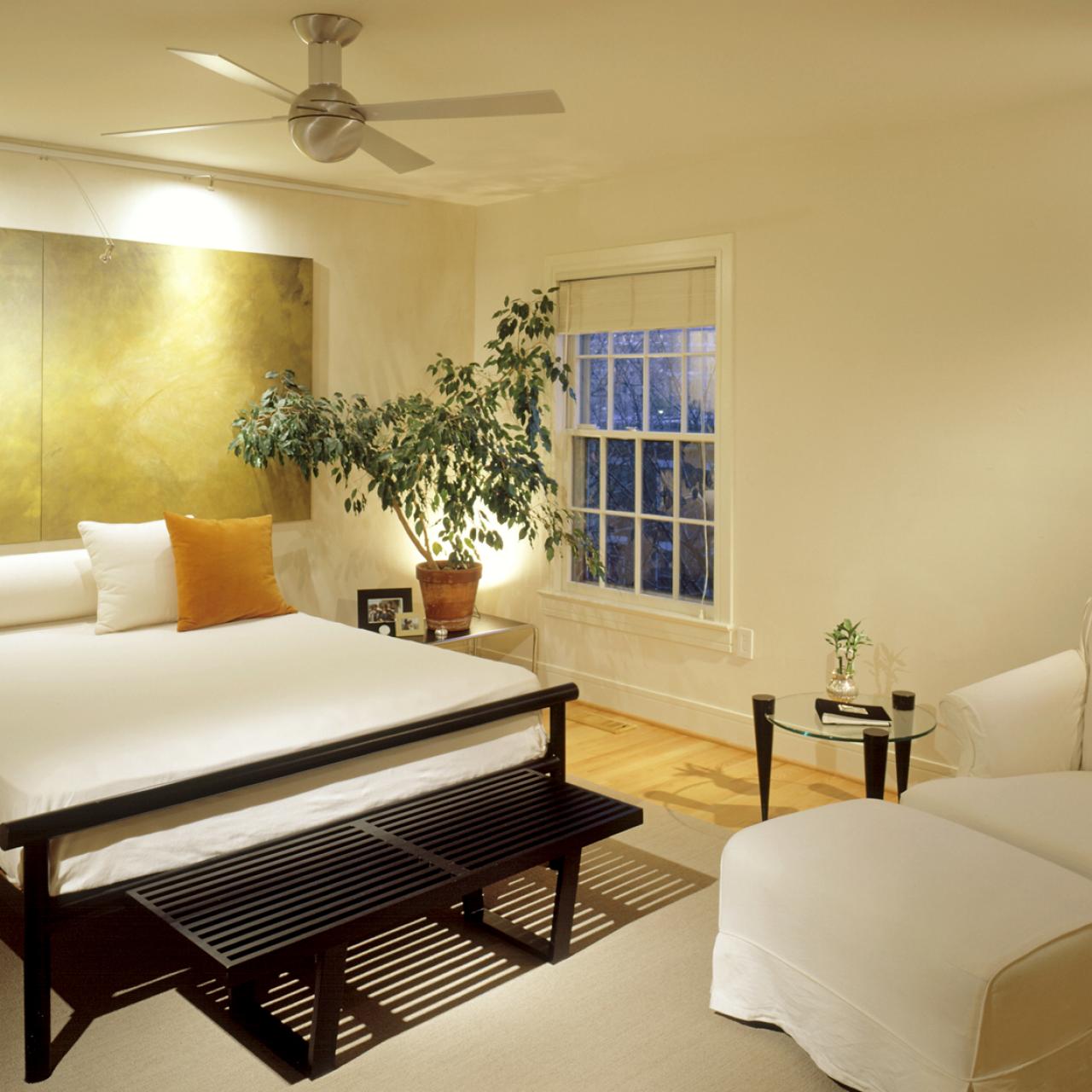 décoration moderne chambre élégant tableau tête de lit originale idée déco coussin draps blancs