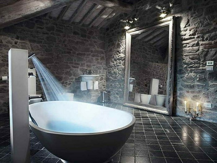 salle de bain idée déco design bougie baignoire pierre revêtement design 