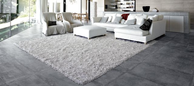 revêtement salon design tapis canapé blanc sol en béton moderne design