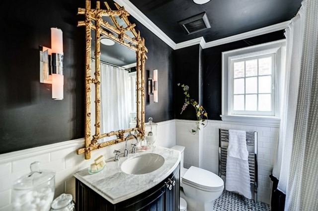 salle de bain noire miroir or lavabo design moderne