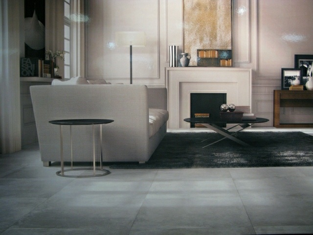 salon de design très moderne table basse noire canapé gris 
