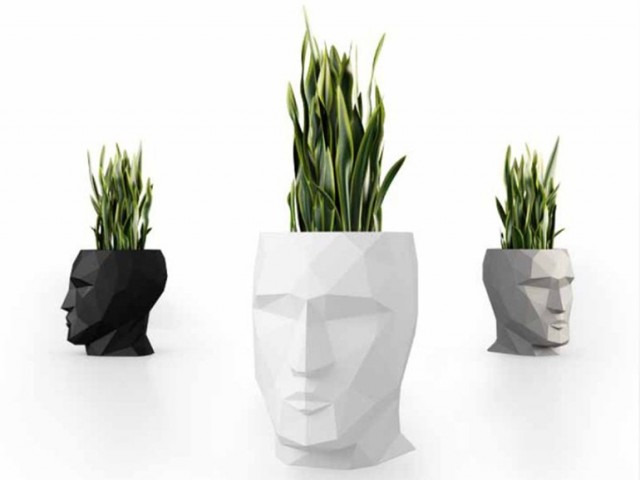 bac à fleurs en forme de tête design pot de fleurs blanc noir idée design moderne