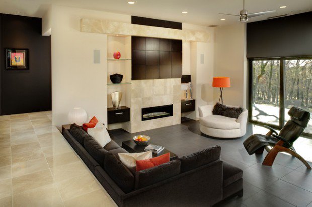 intérieur moderne salon design canapé noir fauteuil cuir lampe orange