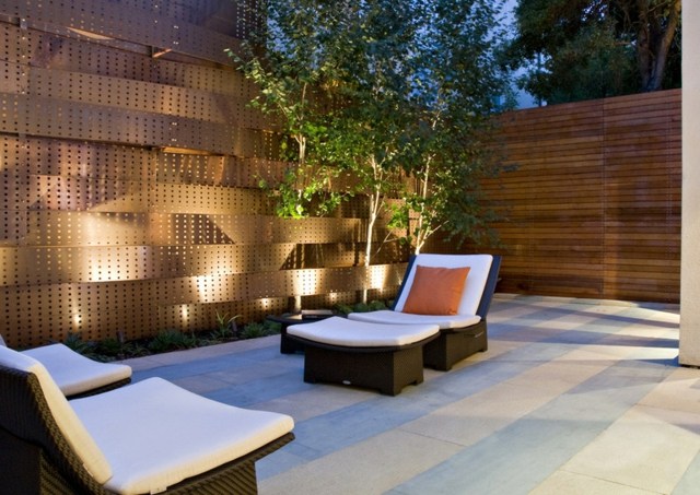 clôture jardin élégante chic moderne fauteuil de jardin coussins idée