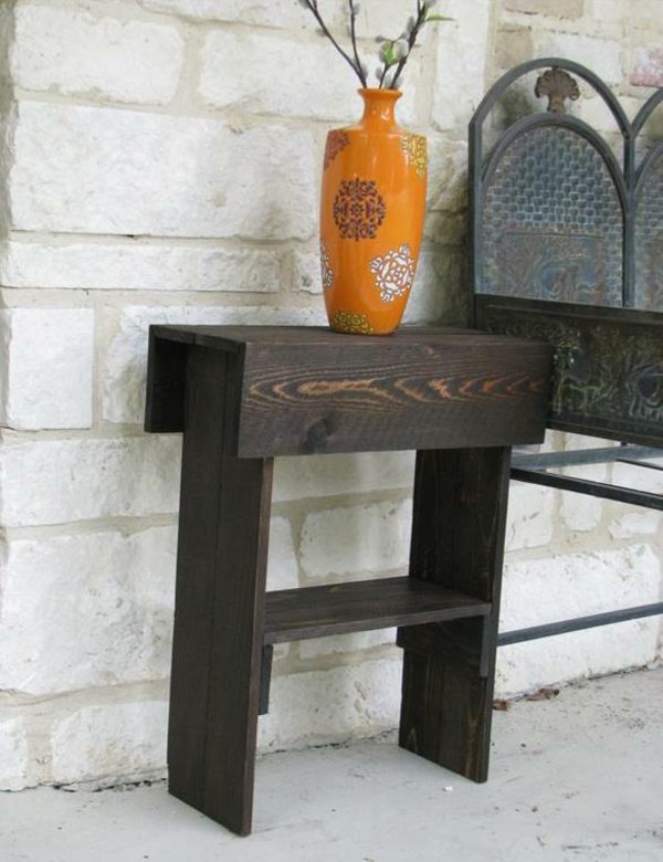 table jardin bois idée vase orange paravan
