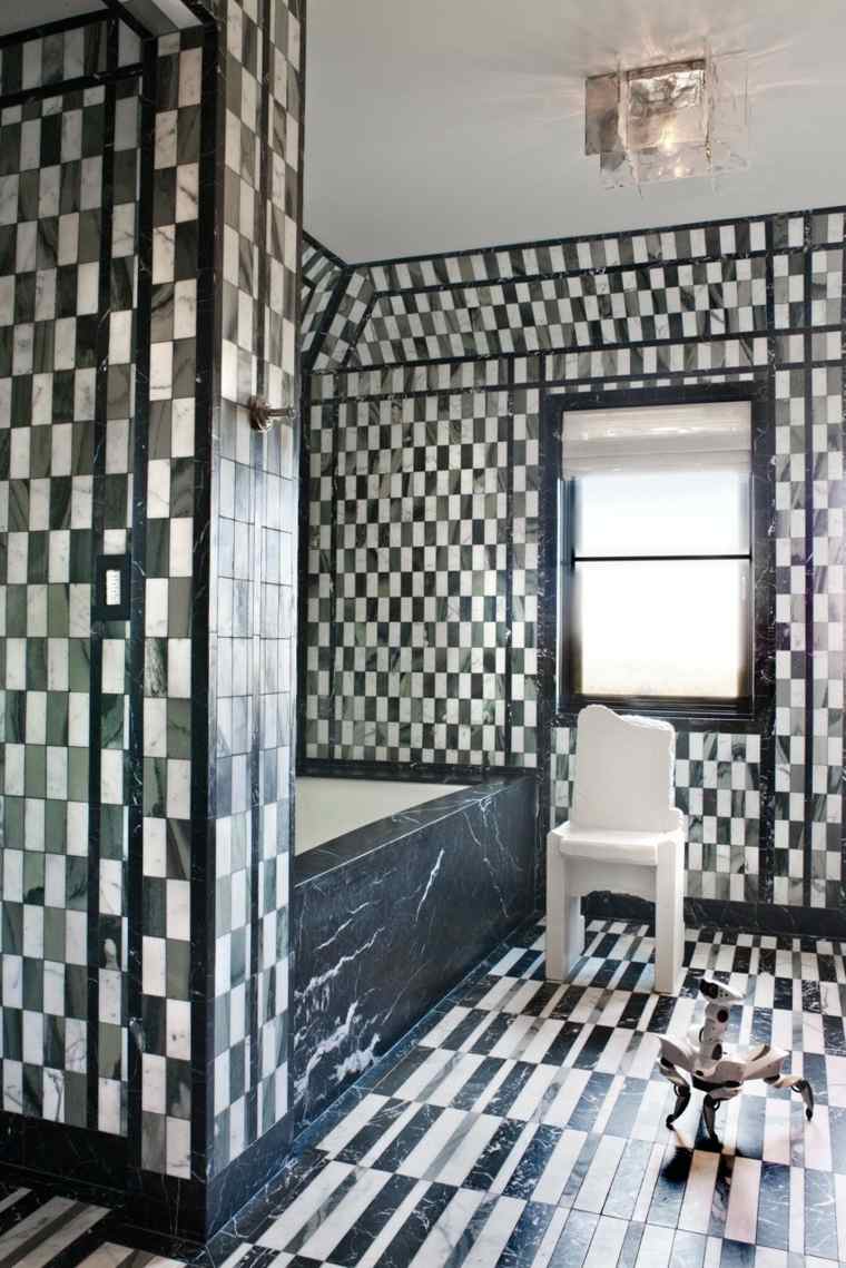 revêtement mural noir carreaux blancs pour salle de bain