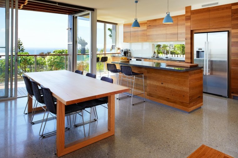 idée aménagement cuisine table en bois design lampe suspendu tapis de sol design