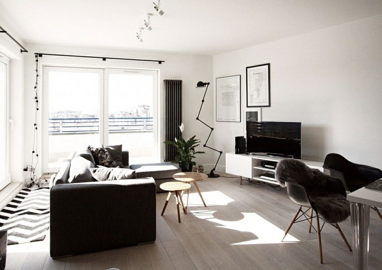 décorer salon idée canapé noir tabouret bois design chaise tapis de sol noir et blanc 