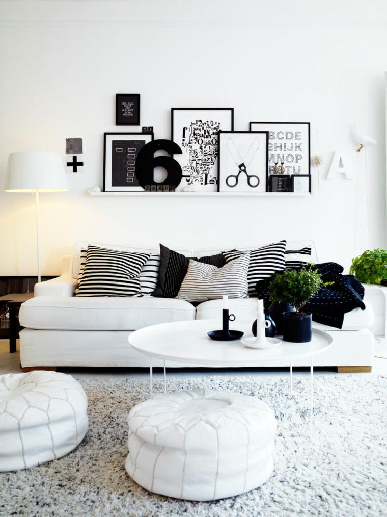 décoration salon moderne idée canapé blanc coussins motifs cadres déco pouf blanc
