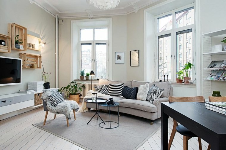 intérieur contemporain minimaliste design tapis de sol gris clair fauteuil table en bois noire