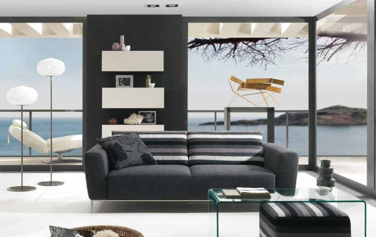 salon moderne gris aménagement gris foncé design canapé table basse en verre 