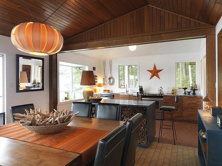 cuisines design ouverte salle à manger table en bois luminaire suspendu étoile déco mur tabouret