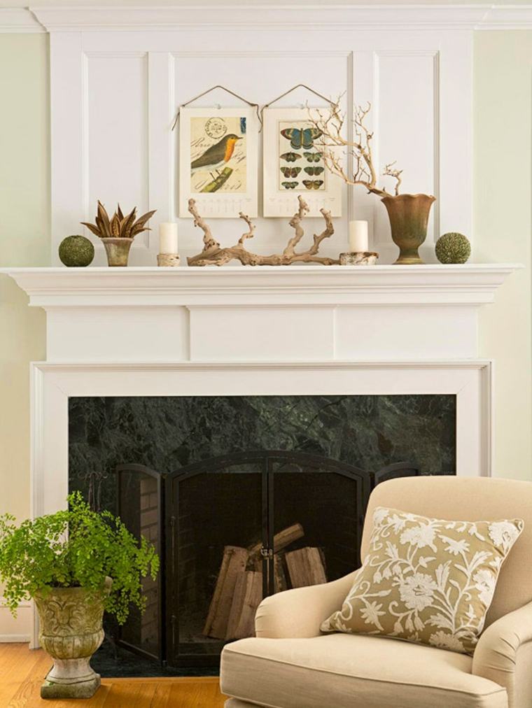 décoration cheminée manteau idée cadre dessin plante fauteuil beige coussin motif