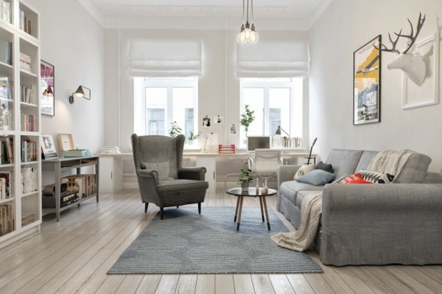 design nordique idée moderne canapé gris tapis de sol fauteuil luminaire en suspension tableau déco 