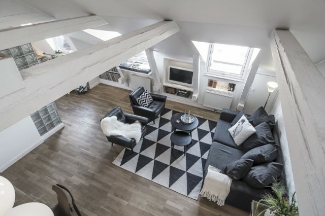 design intérieur moderne tapis de sol noir blanc parquet fauteuil cuir 