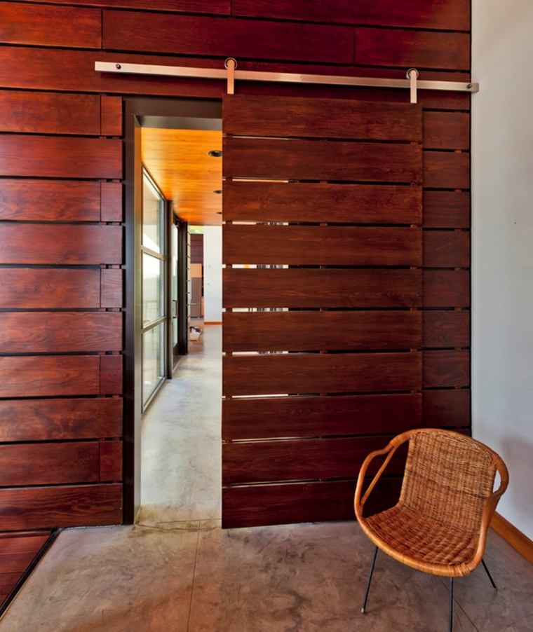 porte à galandage design bois moderne séparation pièce carrelage sol chaise 