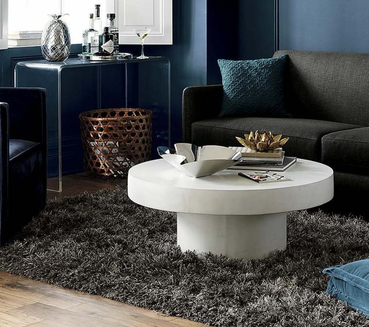 table basse en pierre blanche design tapis de sol noir canapé salon