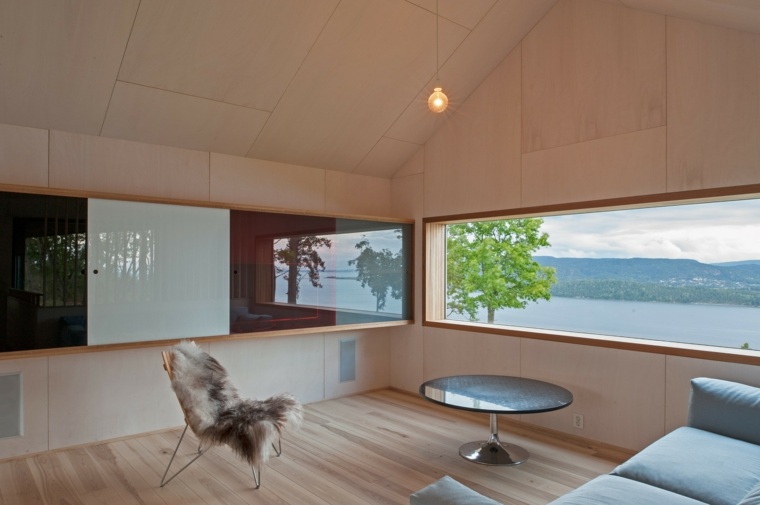 ambiance chaleureuse intérieur moderne bois salon fauteuil table basse ronde design intérieur scandinave
