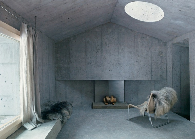 ambiance cosy aménagement salon style scandinave suisse luminaire fauteuil