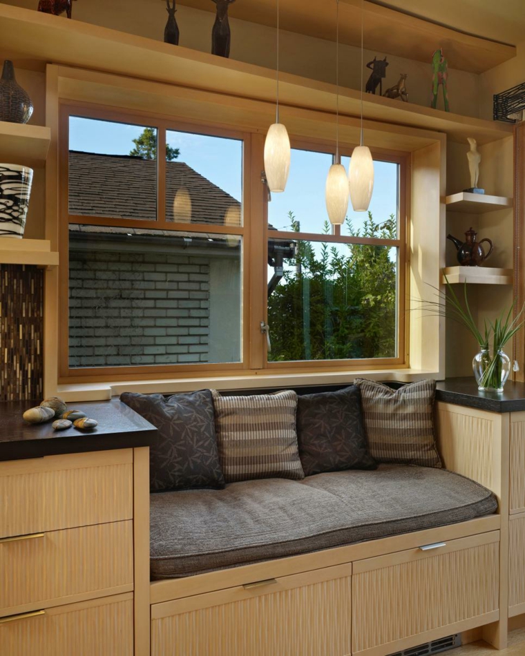 meuble rebord fenêtre idée aménagement coin lecture coussin luminaire suspension déco plante meuble en bois tiroirs