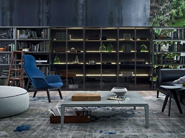 bibliothèque design intérieur moderne rangement étagères salon pouf fauteuil bleu table basse grise