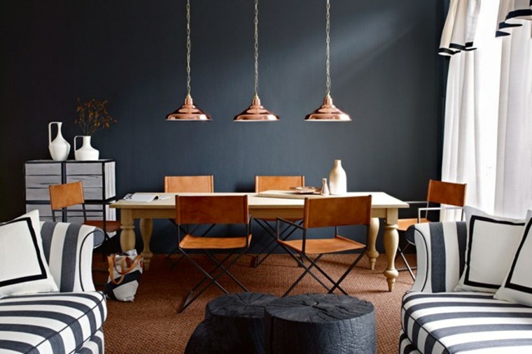 décoration minimaliste design luminaire suspendu fauteuil noir et blanc table noire basse 