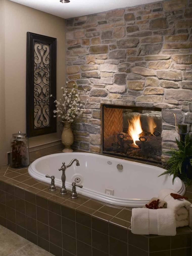 cheminée salle de bain pierre baignoire design tendance mur en pierre briquettes