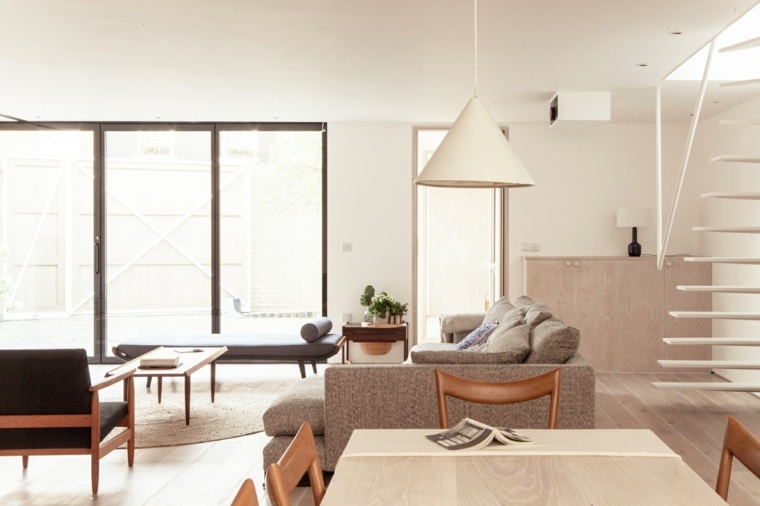 intérieur moderne salon fauteuil aménagement minimaliste cosy luminaire suspendu design table en bois
