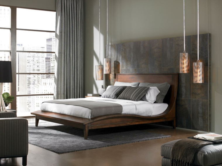 éclairage idée chambre à coucher coussin tapis de sol gris fauteuil luminaire suspendu design moderne rideaux gris clair 