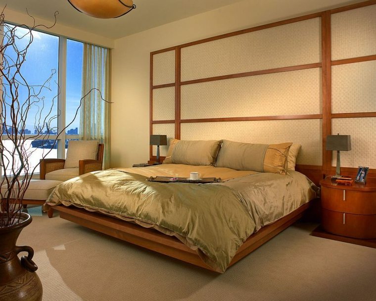 chambre asiatique grand lit deux place déco table de nuit bois design idée fauteuil