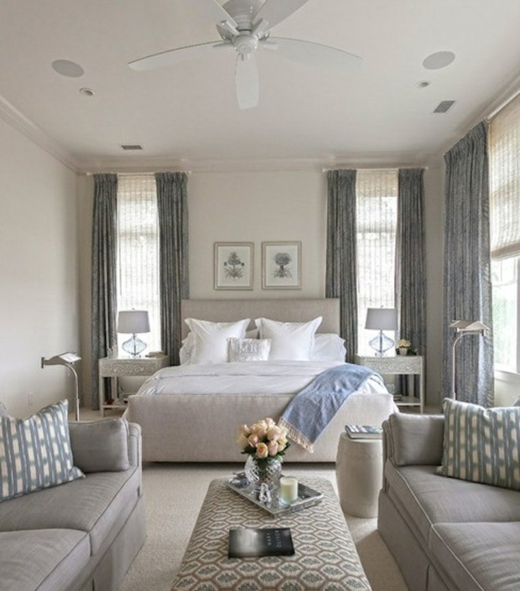 décoration chambre à coucher idée fleurs bouquet lit coussins moderne déco tableau design canapé gris coussins