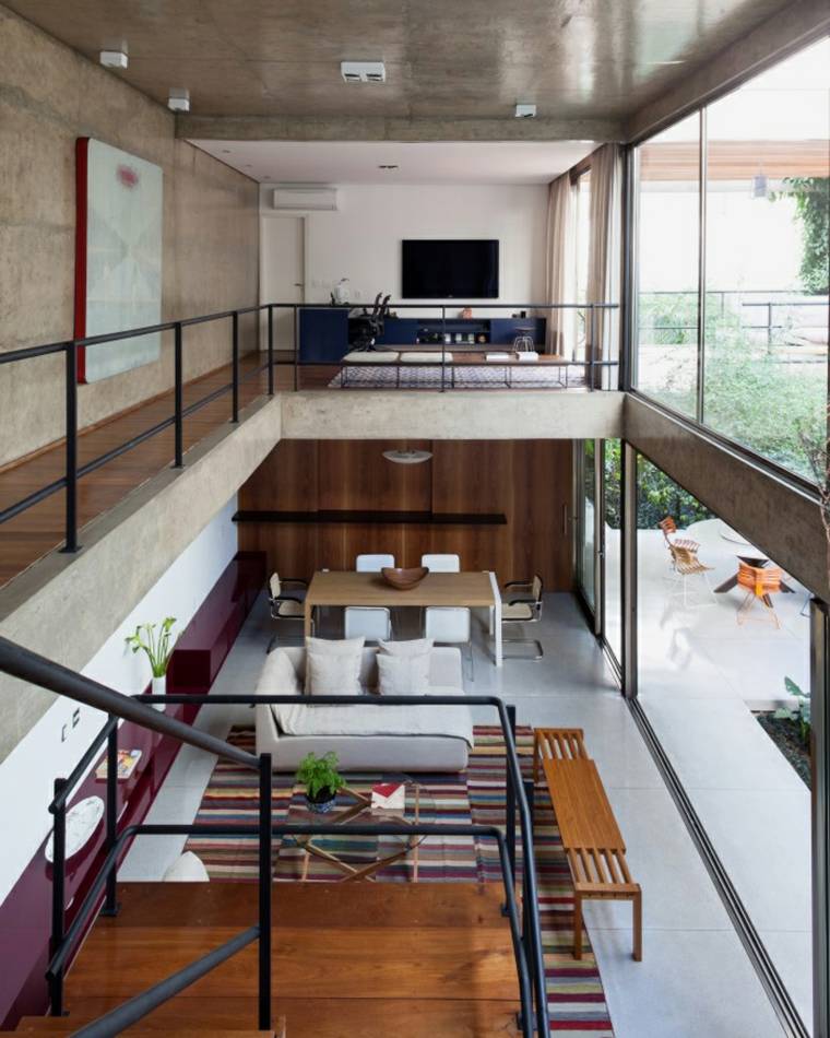 maison contemporaine intérieur idée aménagement salon canapé coussin tapis de sol banc en bois décoration mur tableau