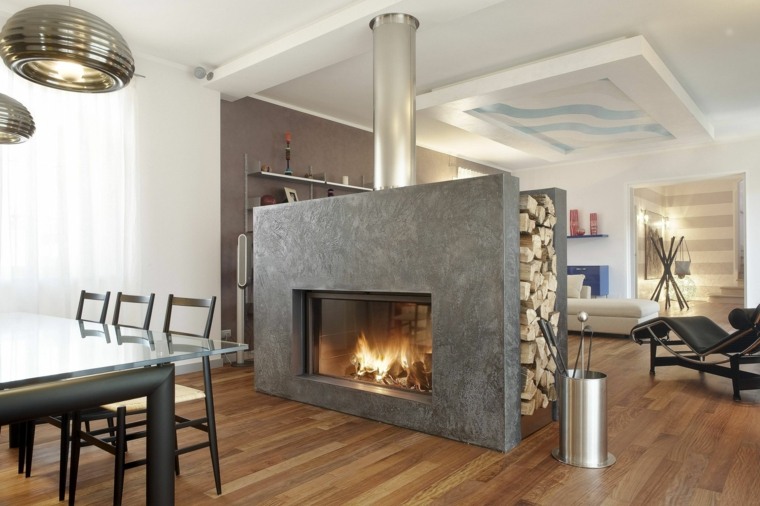 cheminée design habillage pierre idée salle à manger salon fauteuil moderne 