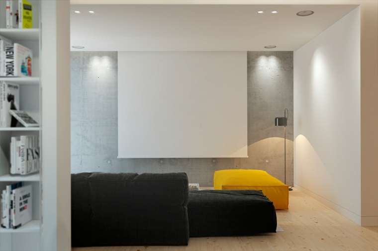 intérieur salon moderne idée aménagement canapé noir pouf jaune design mur déco idée étagères