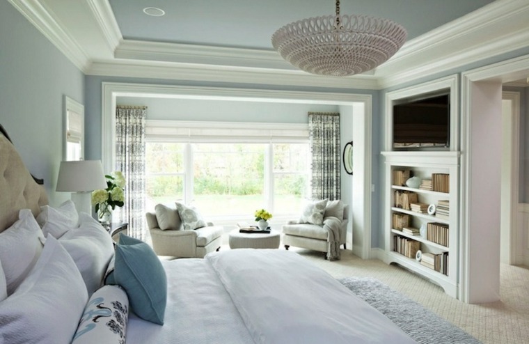 chambre à coucher fauteuil design coussins moderne tapis de sol bibliothèque luminaire suspension design rideaux