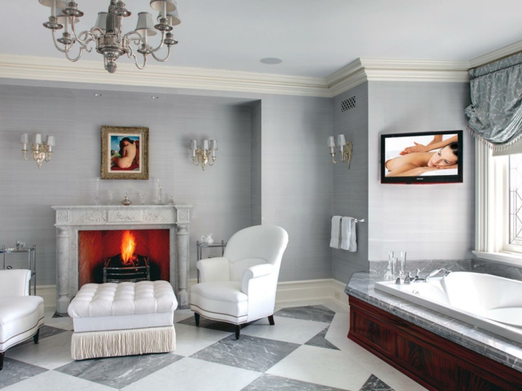salon élégant moderne design fauteuil blanc pouf cheminée pierre blanche idée carrelage salon 