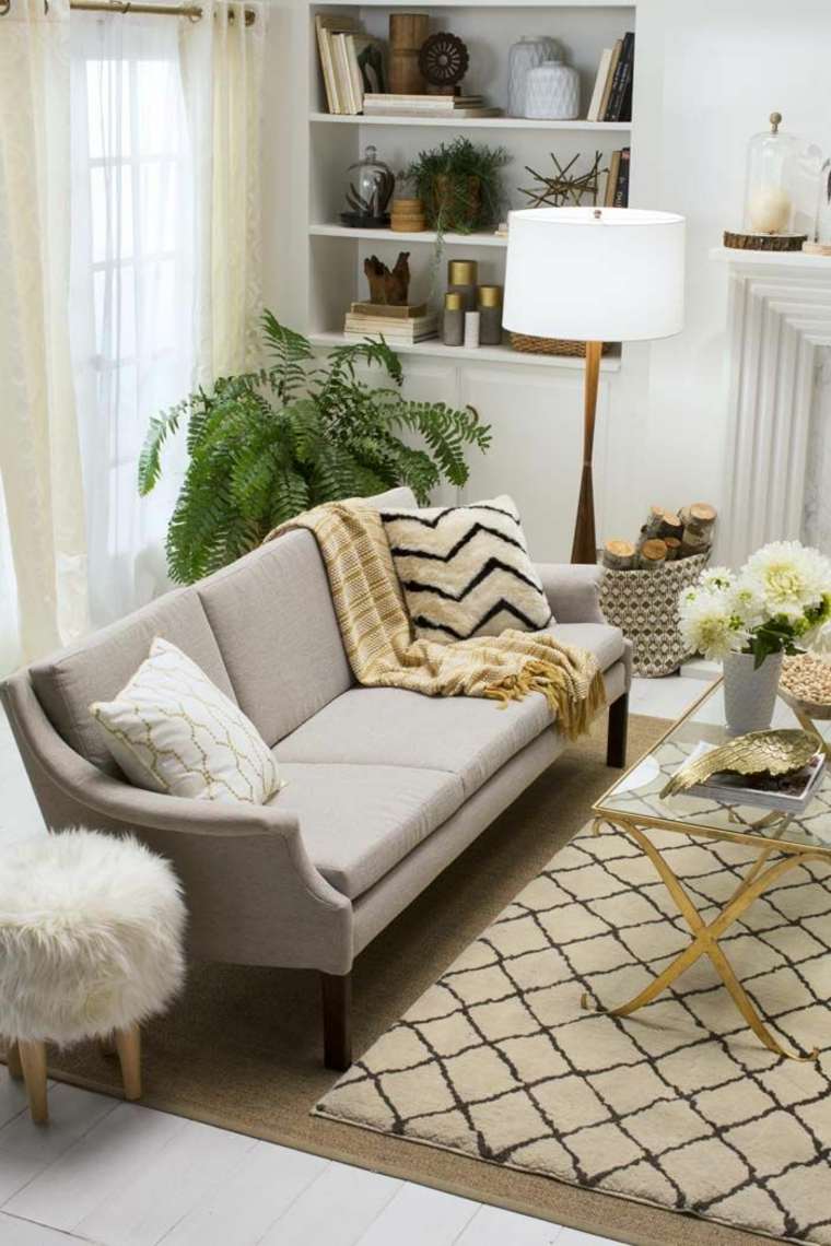 salon minimaliste design canapé coussin déco plante végétation étagères