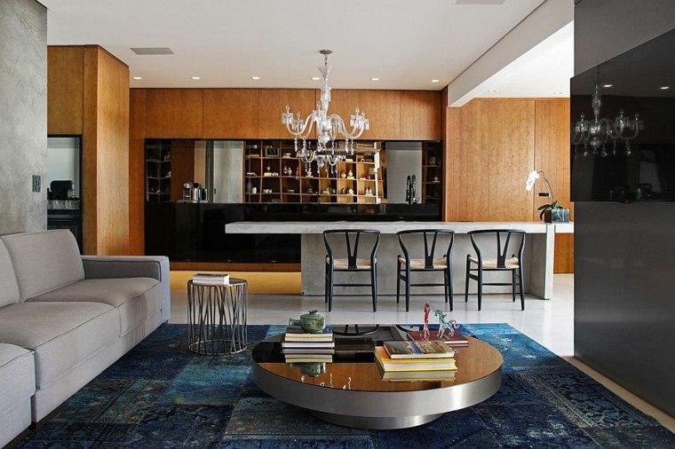 appartement design moderne cuisine îlot idée salon canapé gris table basse luminaire suspension tapis de sol bleu