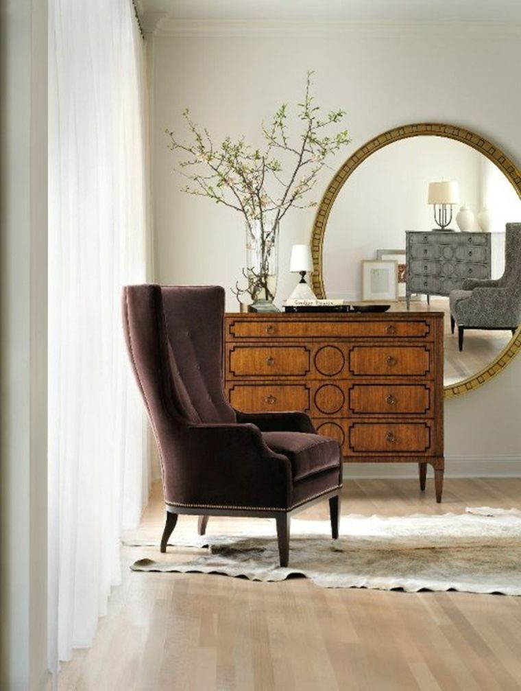 meuble d'entrée aménagement idée bois fauteuil entrée déco fleurs miroir