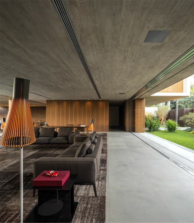 intérieurs modernes béton bois design canapé gris foncé plafond béton style industriel