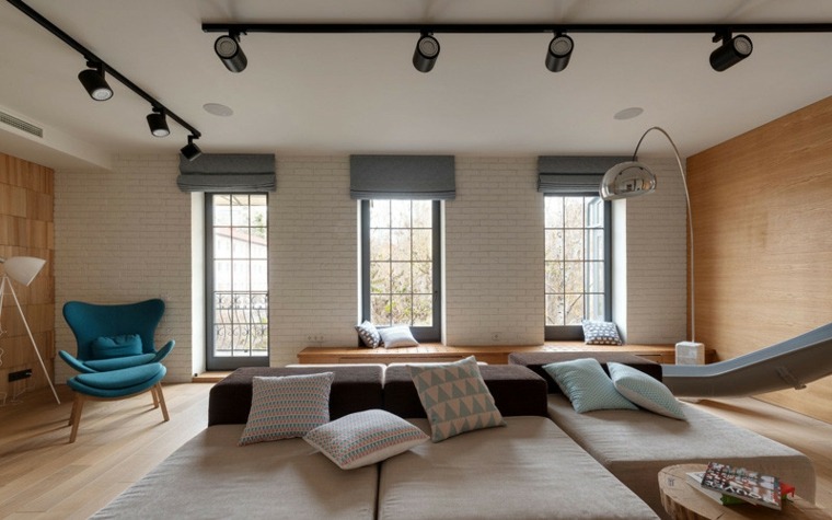 appartement design salon moderne canapé modulable fauteuil bleu plafond luminaire idée design moderne