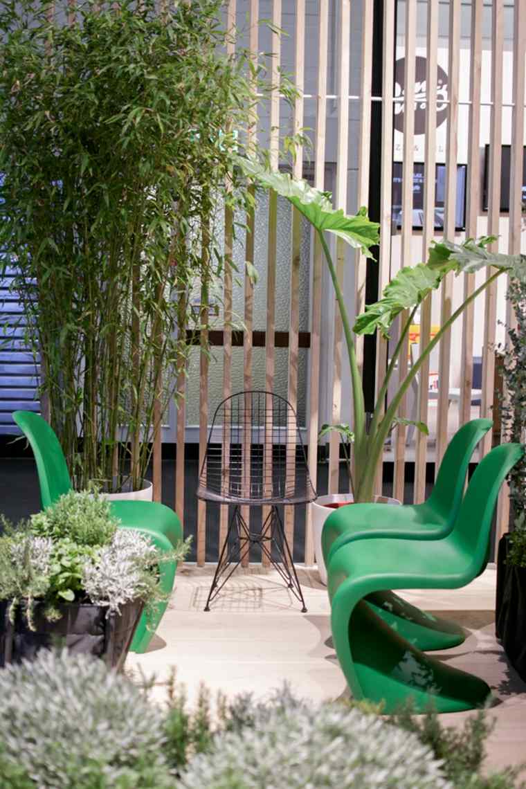 chaise verte rétro design idée moderne déco pot de fleurs verdure 