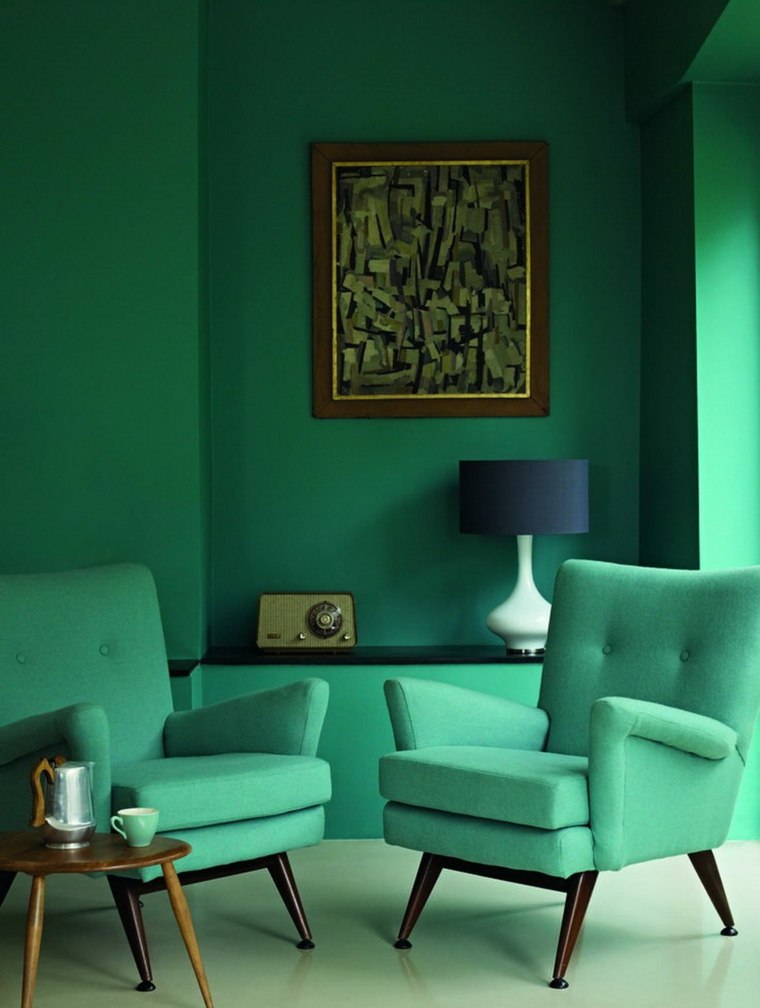 intérieur moderne design fauteuil vert idée mur peinture verte déco tableau design 