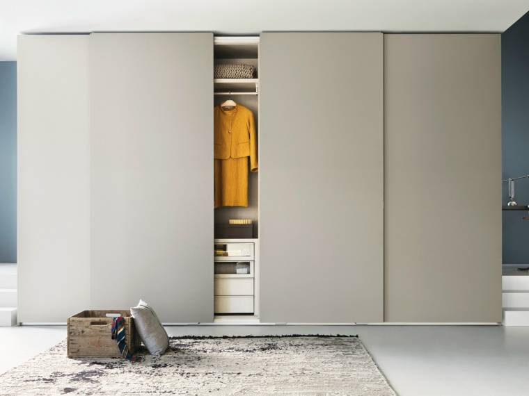 armoire design porte coulissante aménagement chambre à coucher moderne idée intérieur bois design tapis de sol