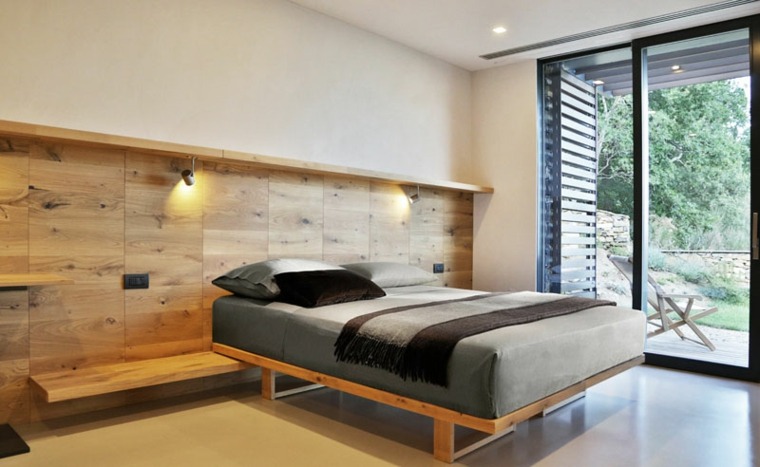 maison en pierre chambre à coucher design lit mur bois 